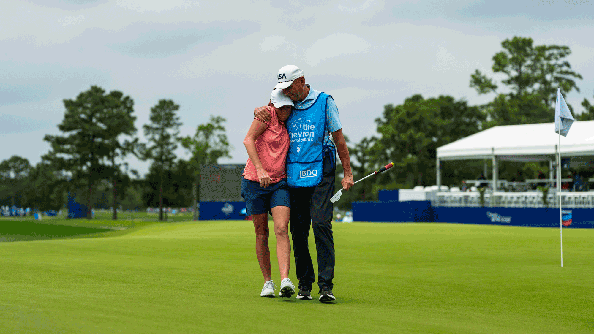 Stacy Lewis and her father, Dale, who caddied for her on the 18th hole at Memorial Park, one last father-daughter walk up the fairway and into retirement at the 2026 The Chevron Championship. (Photo by Jeff Marsh/The Chevron Championship)