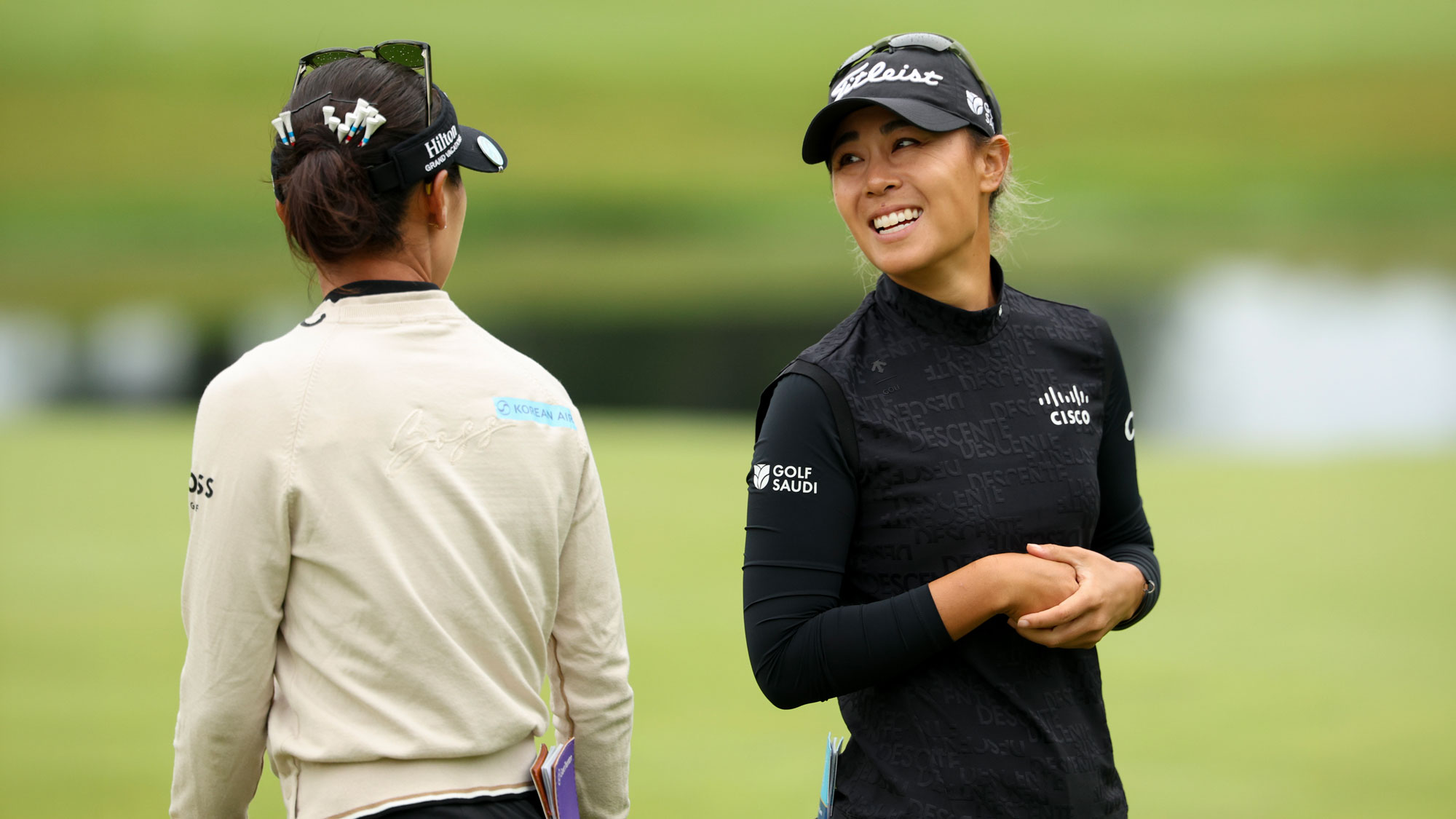 Danielle Kang and Lydia Ko of New Zealand talk on the fifth hole during the first round of the Dow Championship 2025 at Midland Country Club on June 26, 2025 in Midland, Michigan. 