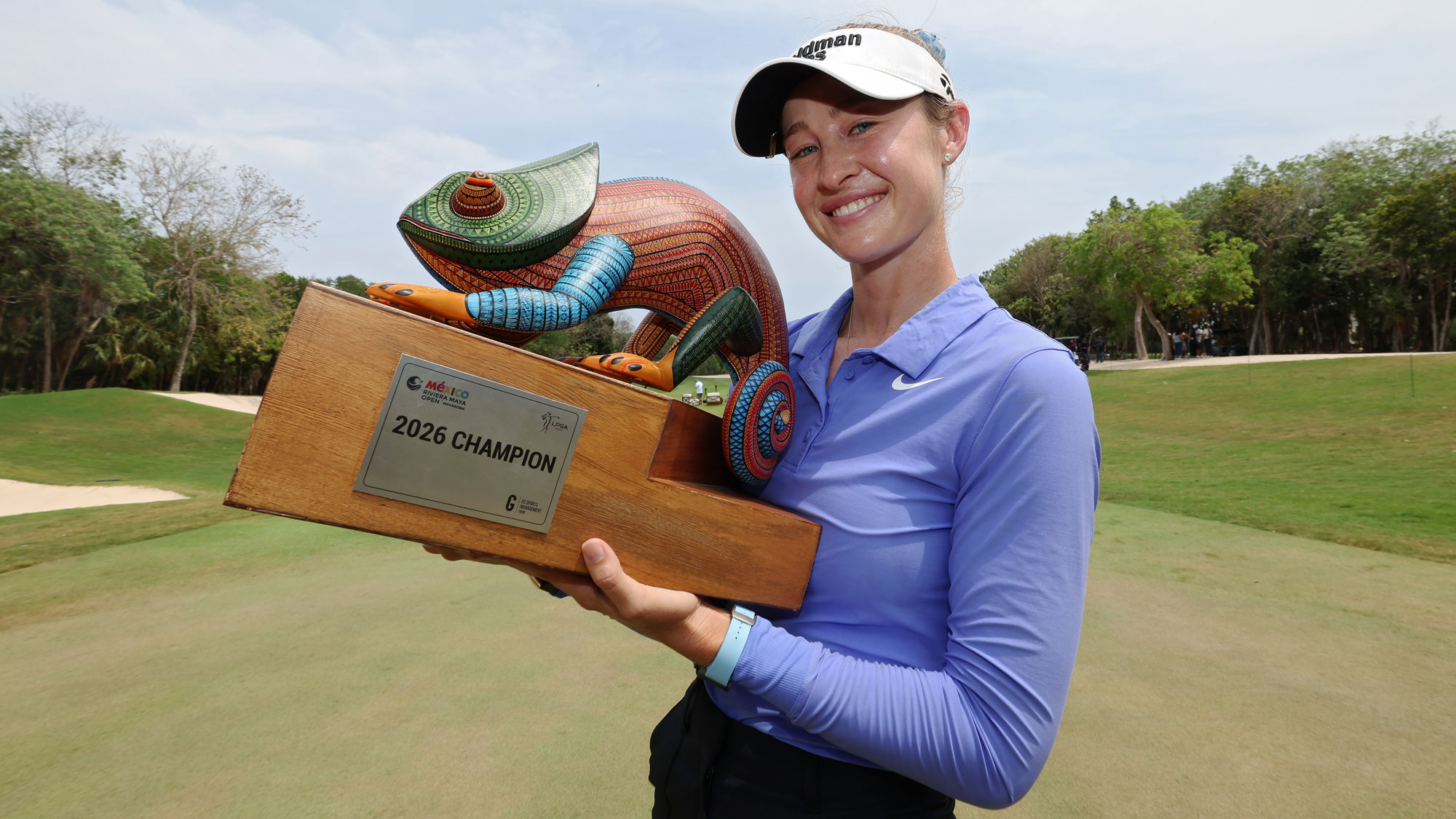 Nelly Korda of the United States poses for photos with the trophy during the trophy ceremony after winning the Mexico Riviera Maya Open at Mayakoba 2026 at El Camaleon at Mayakoba on May 03, 2026 in Playa del Carmen, Mexico.
