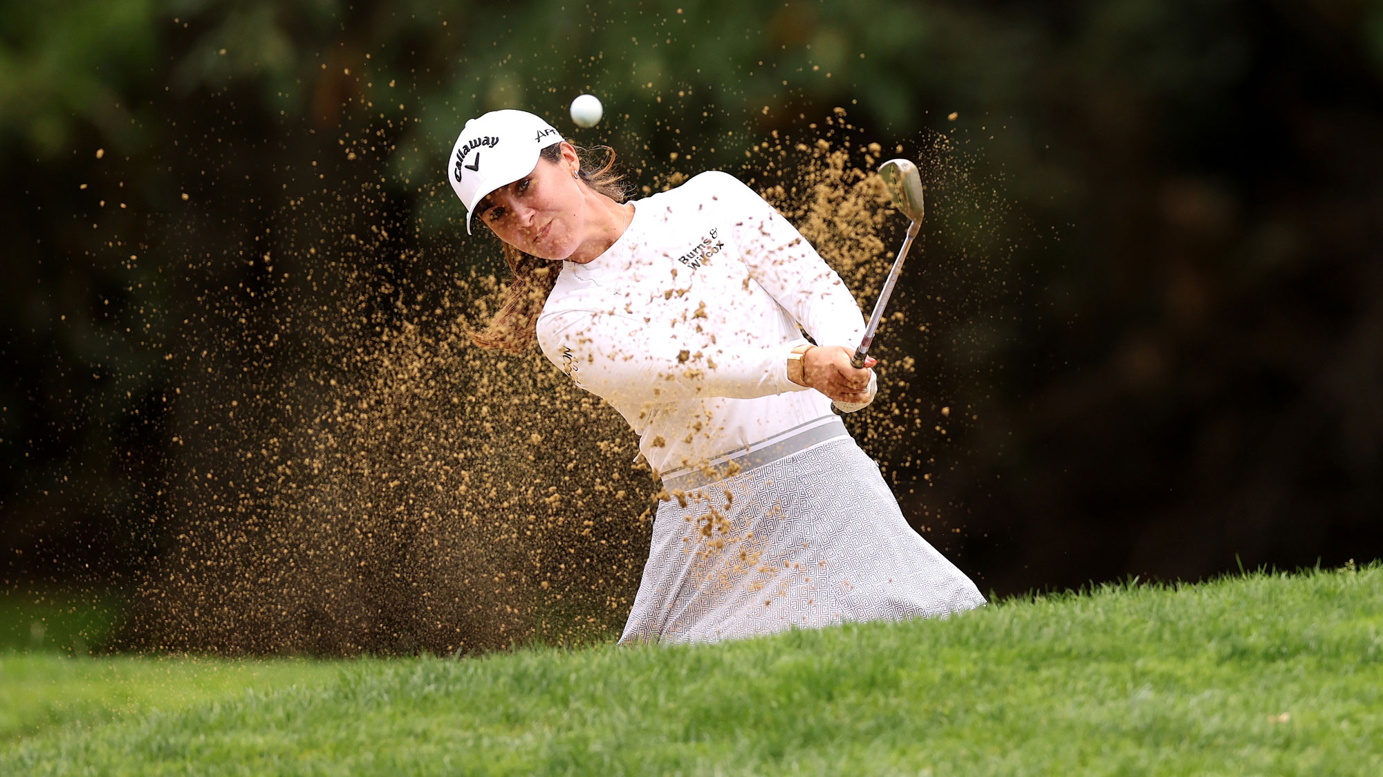 ophia Schubert of the United States plays a shot from a bunker on the fourth hole during the third round of The Standard Portland Classic 2026 at Columbia Edgewater Country Club on August 15, 2026 in Portland, Oregon.