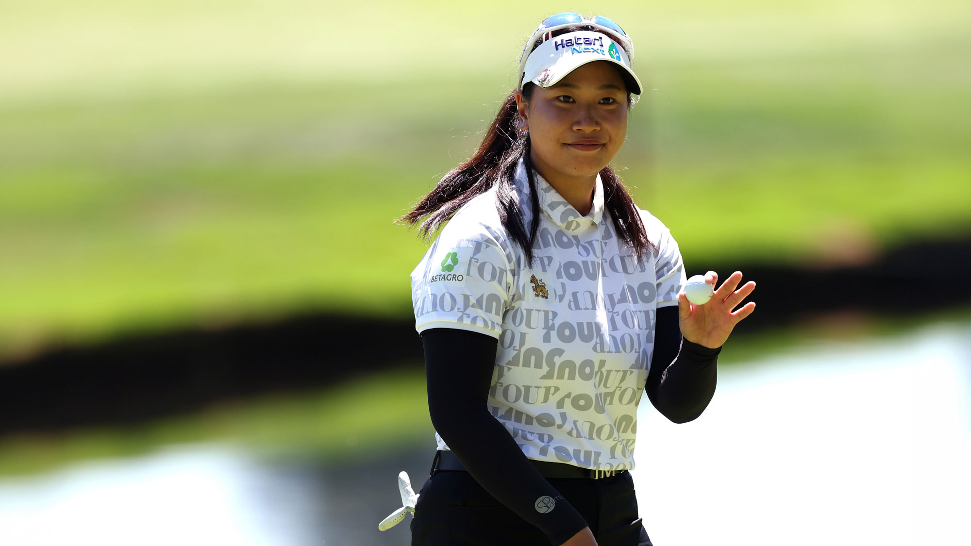 Chanettee Wannasaen of Thailand acknowledges the crowd on the 18th green during the final round of The Standard Portland Classic 2026 at Columbia Edgewater Country Club on August 16, 2026 in Portland, Oregon.